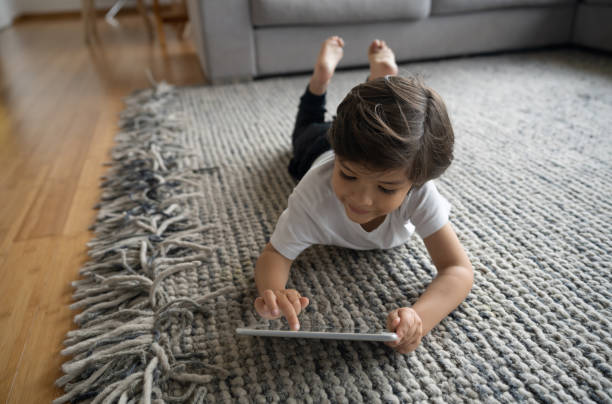 Kid on carpet | Jack's Carpet And Tile