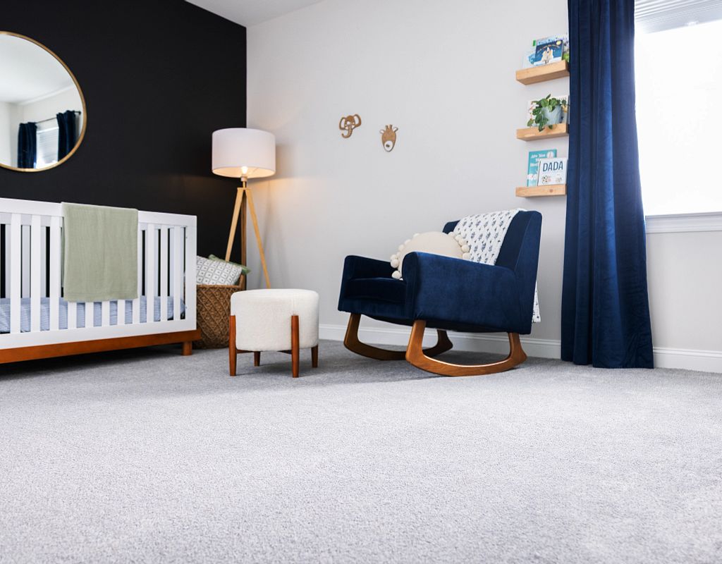 Blue chair on Carpet floor | Jack's Carpet & Tile