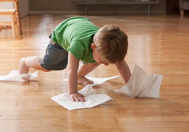Kid cleaning floor | Jack's Carpet & Tile