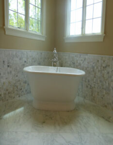 Bathroom tile flooring with bath tub | Jack's Carpet & Tile